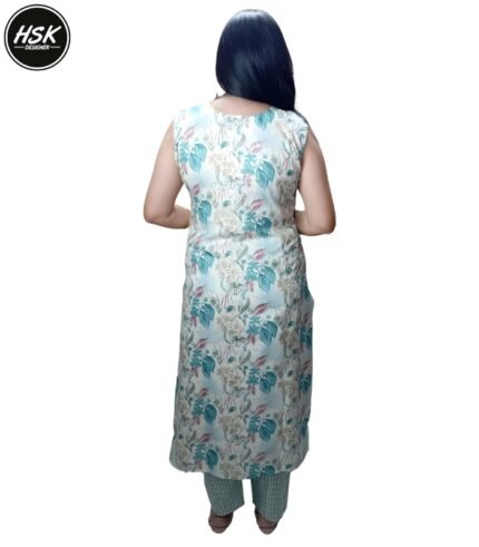 Elevate your ethnic wardrobe with this stunning three-piece kurti set featuring a mesmerising tropical floral print in serene turquoise and white hues. The sleeveless kurti showcases an exquisite design with delicate golden embellishments along the centre panel, complemented by decorative buttons and intricate detailing. The matching pants feature a coordinated turquoise pattern, while the solid turquoise dupatta completes the ensemble perfectly. The cotton fabric ensures comfort and breathability, making it ideal for various occasions. The kurti's sophisticated neckline is enhanced with a decorative trim, and the overall silhouette offers a flattering fit. This versatile set can be styled with traditional jewellery for festivities or worn with minimal accessories for a contemporary look. The combination of classic design elements with modern aesthetics makes this outfit a must-have addition to your wardrobe.