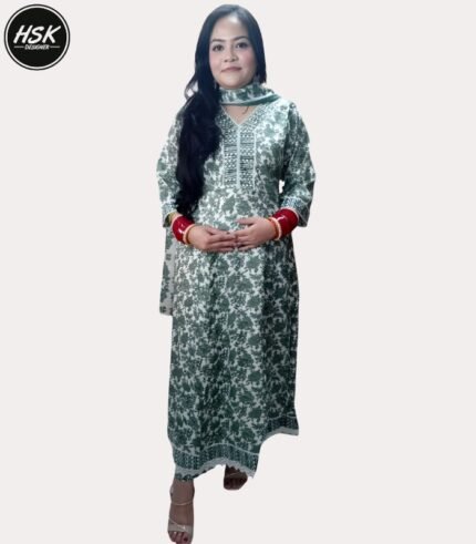 Elevate your ethnic wardrobe with this stunning full-length kurti dress in a sophisticated green and white floral print. The dress features exquisite white lace detailing along the V-neckline, creating an elegant contrast against the verdant floral pattern. The full-length silhouette offers graceful movement, while the long sleeves with gathered cuffs add a touch of vintage charm. The traditional design is beautifully modernised with intricate geometric patterns adorning the neckline and hem. Crafted with attention to detail, this kurti dress combines comfort with style, making it perfect for festive occasions or formal events. The white base with sage green floral motifs creates a fresh, timeless appeal. The dress includes delicate embellishments and can be paired with matching bottoms for a complete ensemble. The flowing silhouette ensures comfort throughout the day while maintaining a sophisticated appearance.