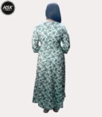 Elevate your ethnic wardrobe with this stunning full-length kurti dress in a sophisticated green and white floral print. The dress features exquisite white lace detailing along the V-neckline, creating an elegant contrast against the verdant floral pattern. The full-length silhouette offers graceful movement, while the long sleeves with gathered cuffs add a touch of vintage charm. The traditional design is beautifully modernised with intricate geometric patterns adorning the neckline and hem. Crafted with attention to detail, this kurti dress combines comfort with style, making it perfect for festive occasions or formal events. The white base with sage green floral motifs creates a fresh, timeless appeal. The dress includes delicate embellishments and can be paired with matching bottoms for a complete ensemble. The flowing silhouette ensures comfort throughout the day while maintaining a sophisticated appearance.